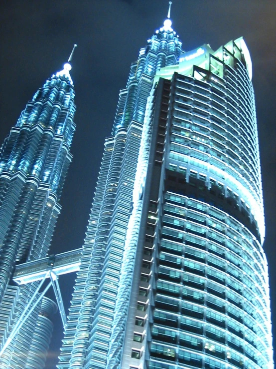 two building in the night light up