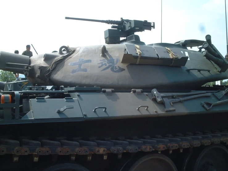 an army tank is shown with its light guns