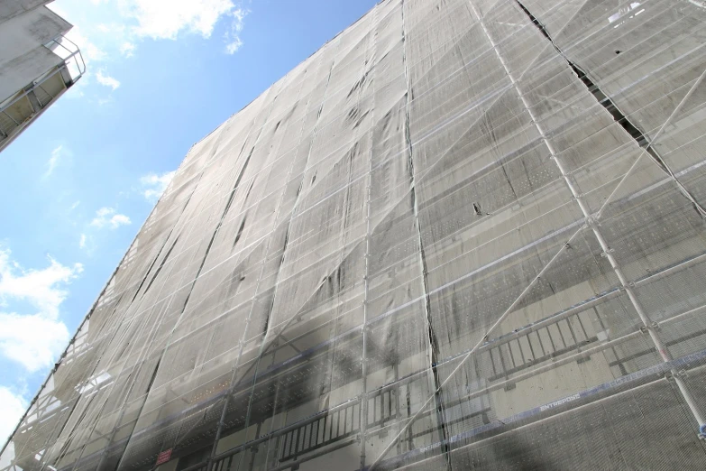 looking up at the side of a huge structure