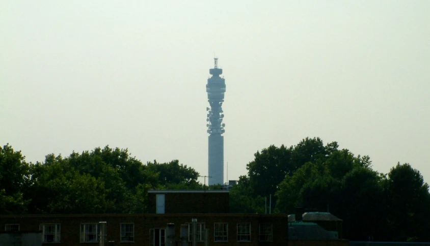 there is a very tall tower at the top of a hill