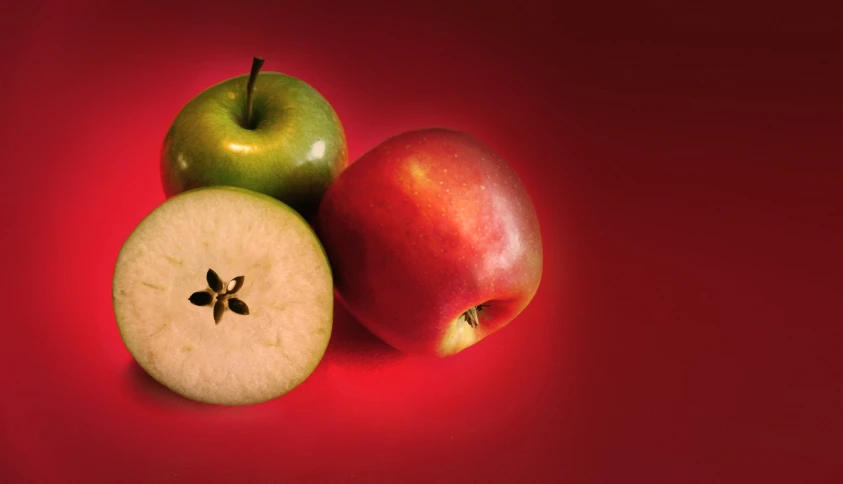 three different types of apples on top of each other