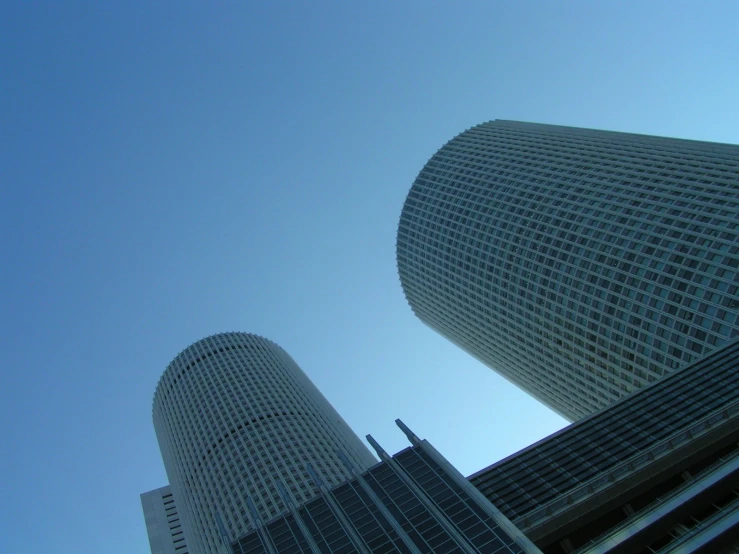 the view up at some very large skyscrs