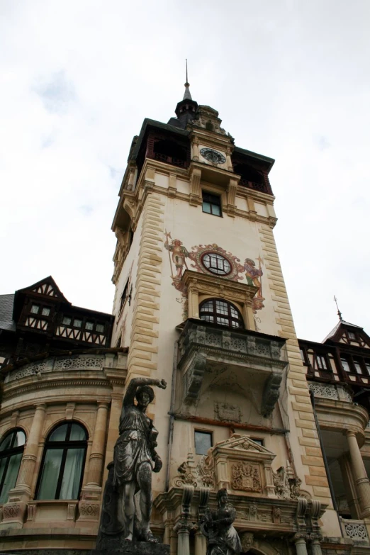 a tall building with a clock on the top of it