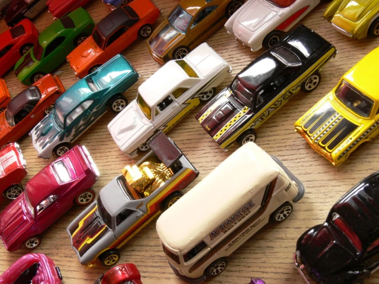 a bunch of cars sitting on top of a table