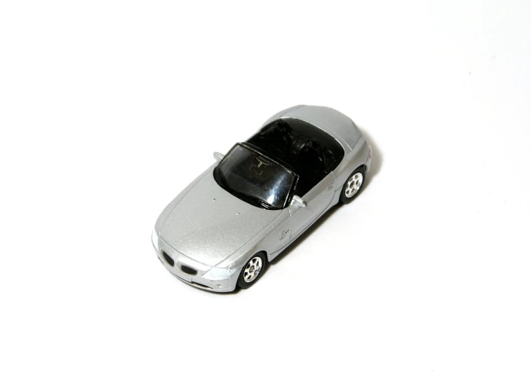 a small car toy is shown in this po
