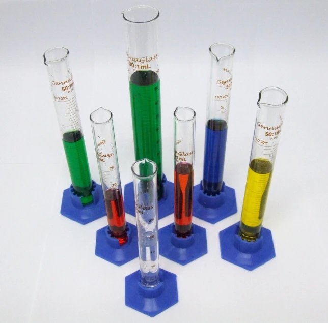 four different colors tubes are on display in plastic holders