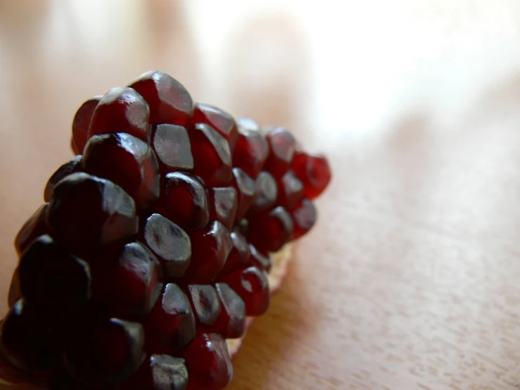 there is a decorative piece of fruit on the table