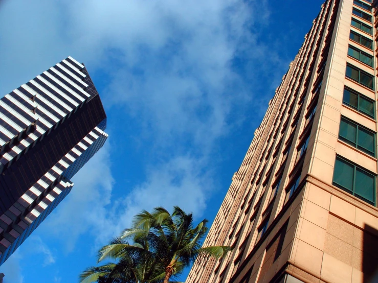 a tall building with a blue sky in the background