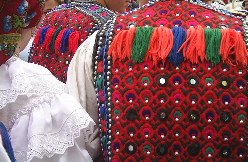 two women are looking at soing on display