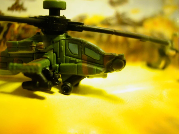 close up of military helicopter model on counter