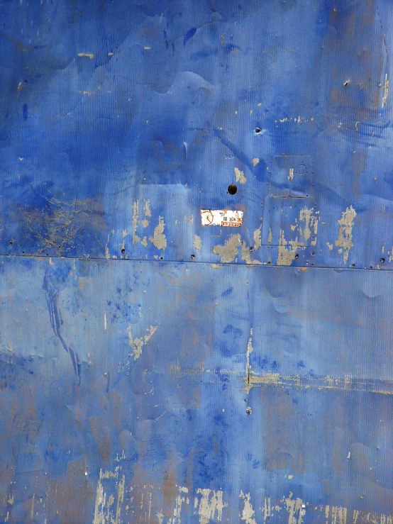 blue and grey wall with the name blaco written in front