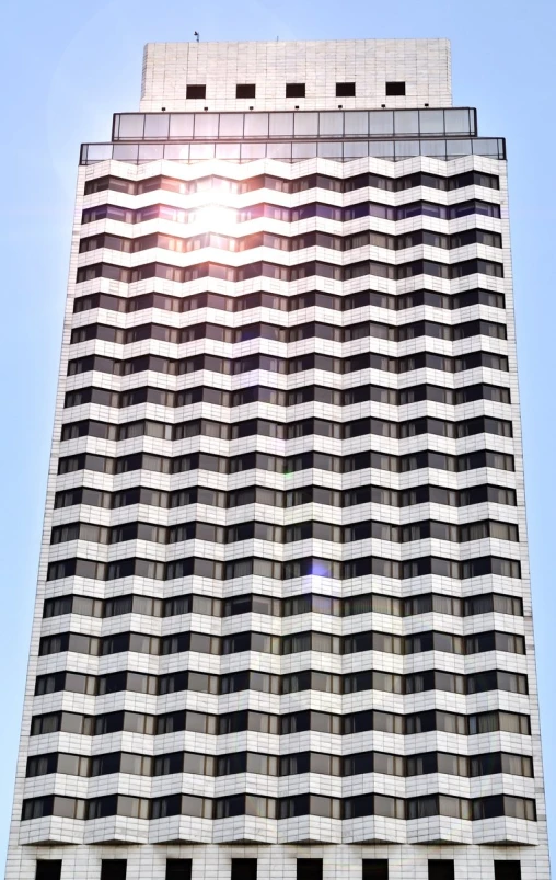 the windows of a tall building make this po look amazing