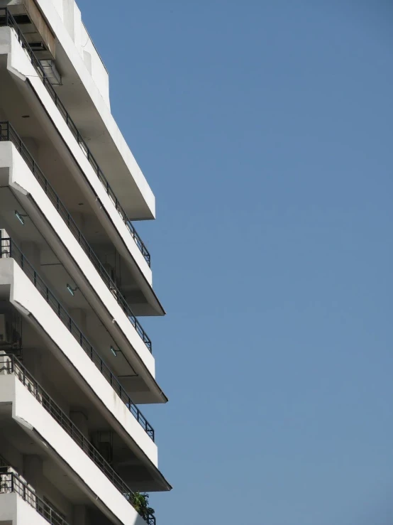 a close up of a very tall white building