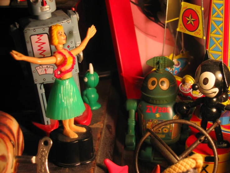 toys and toy figure displayed on a wooden table