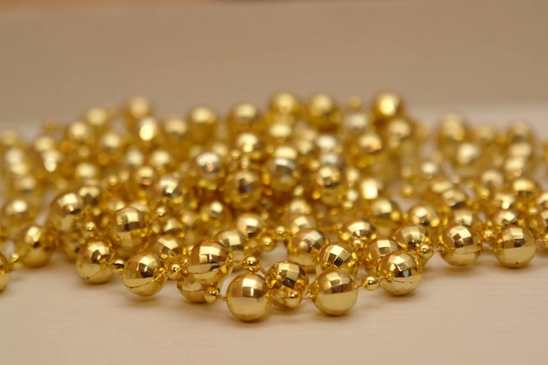 the gold beads have very large holes that are also polished