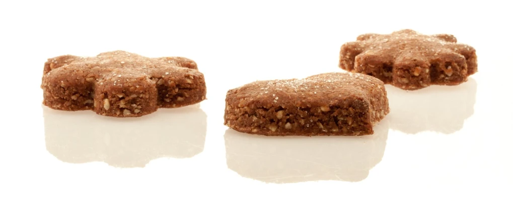 a group of small desserts sitting on top of a white surface