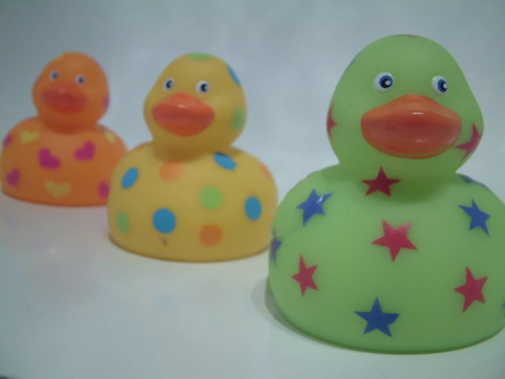 rubber ducks are in different patterns and colors