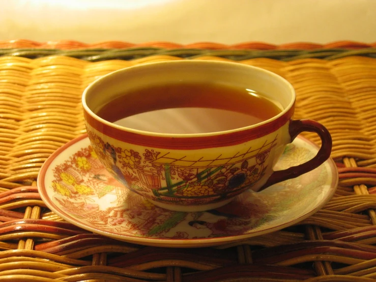 a cup of tea sitting on top of a saucer