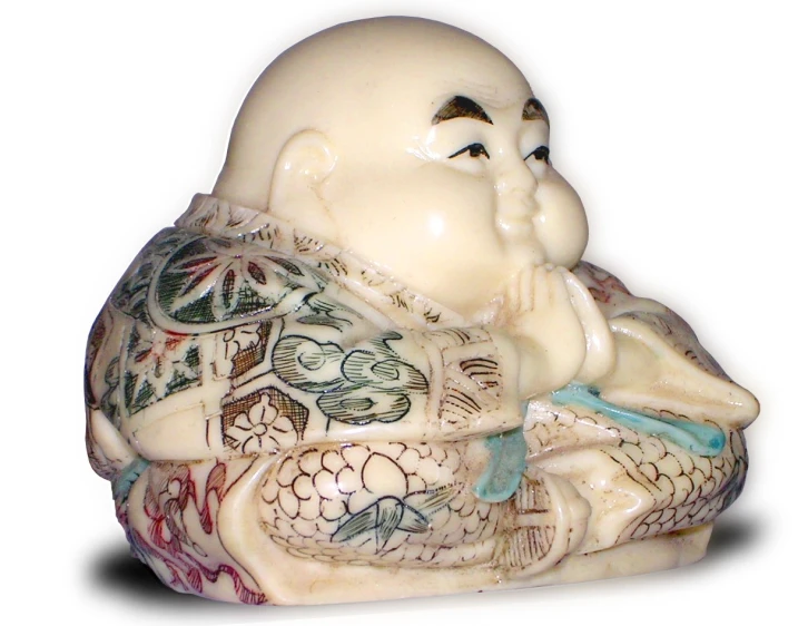 a buddha statue sitting on its side