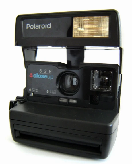 polaroid is the world's first digital camera that has an up top shutter