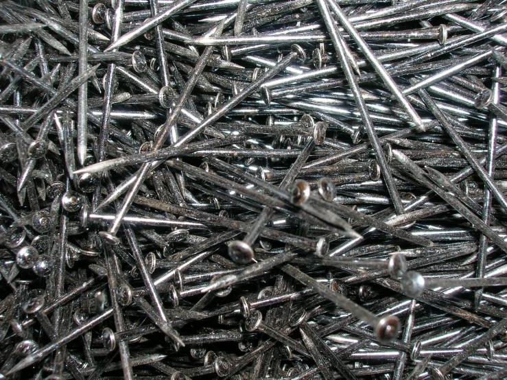 silver needles are piled on top of each other
