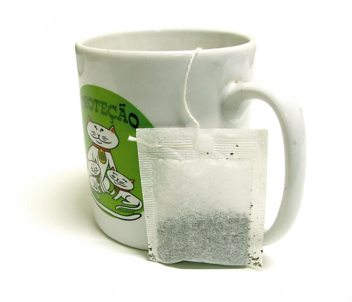 an up close image of a coffee cup and its packet