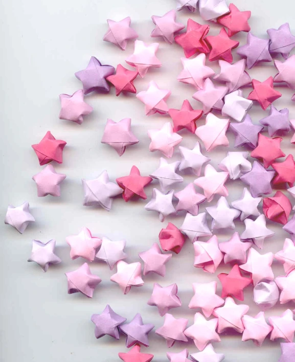 several star shapes in pink, lila and pink