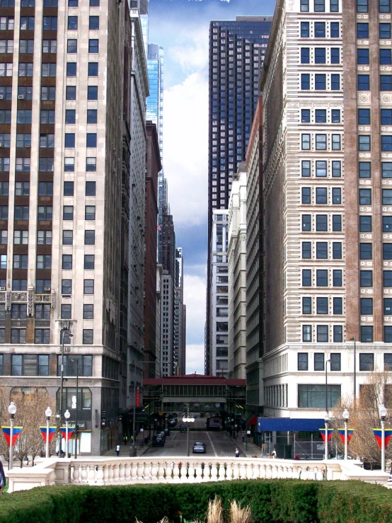 view from a water fountain of two buildings and a street