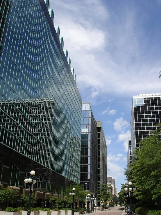 a couple of tall buildings on a street