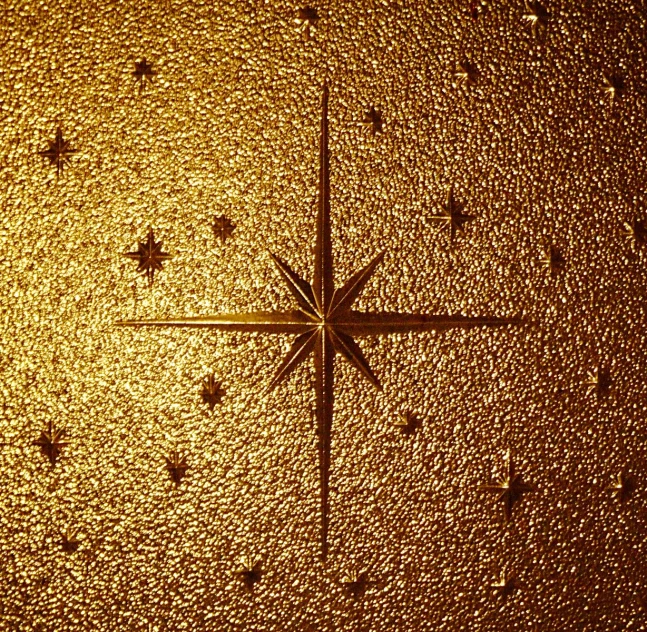 a closeup view of an elaborately detailed star and its diamond shapes