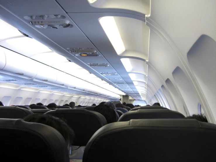 a passenger plane's back and back walls with windows