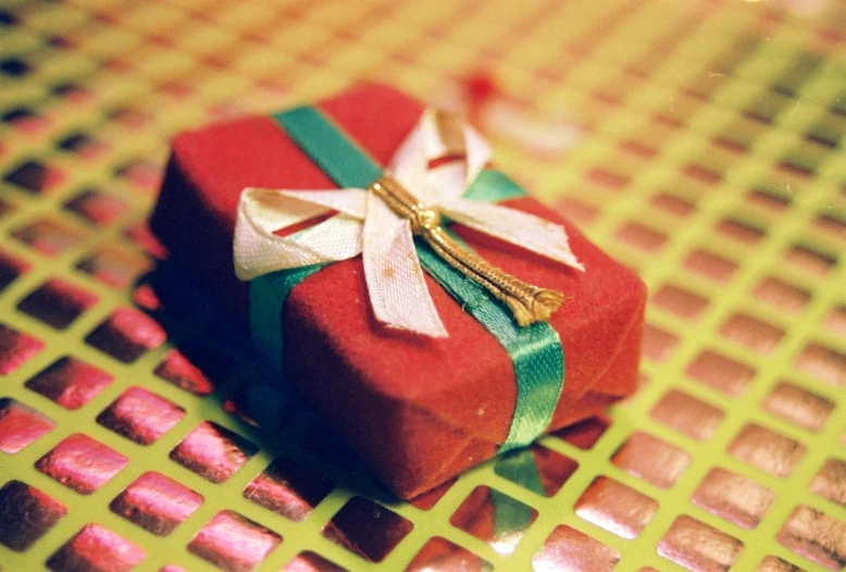 a small wrapped present sitting on a table