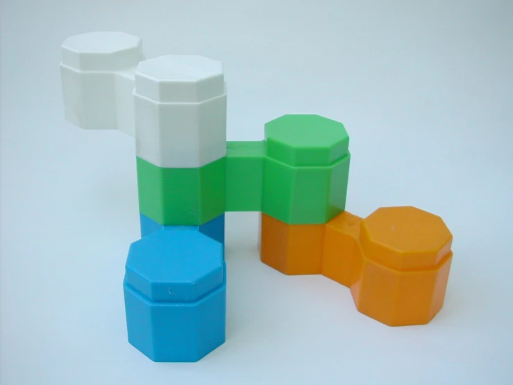 various colored wooden blocks arranged in a stack