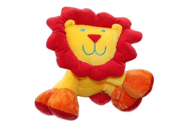 a stuffed lion toy flying in the air