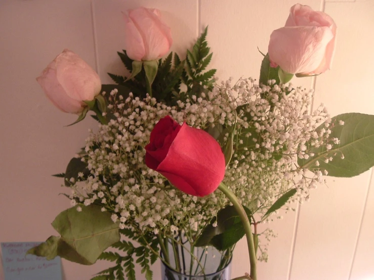 a vase filled with flowers on top of a table