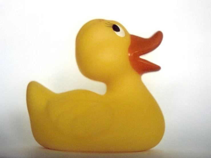 a rubber duck sitting on a white table