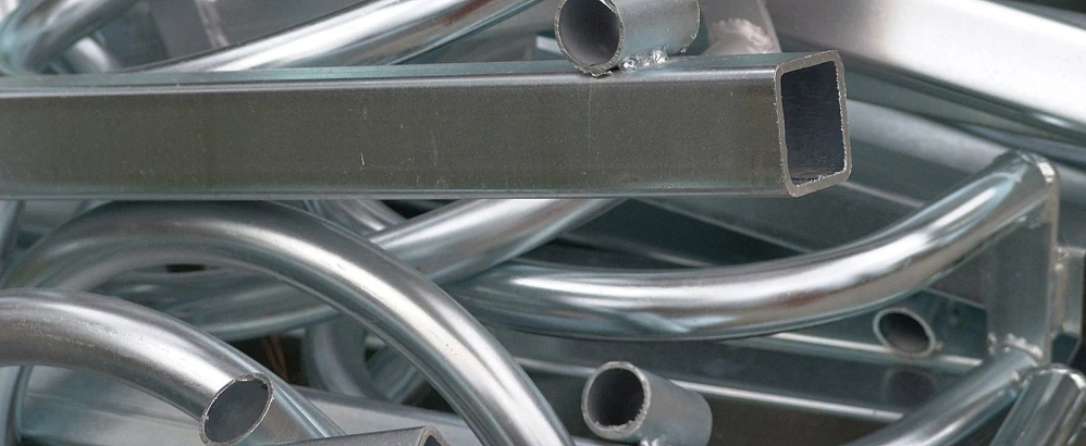 a collection of metal tubes that are stacked together