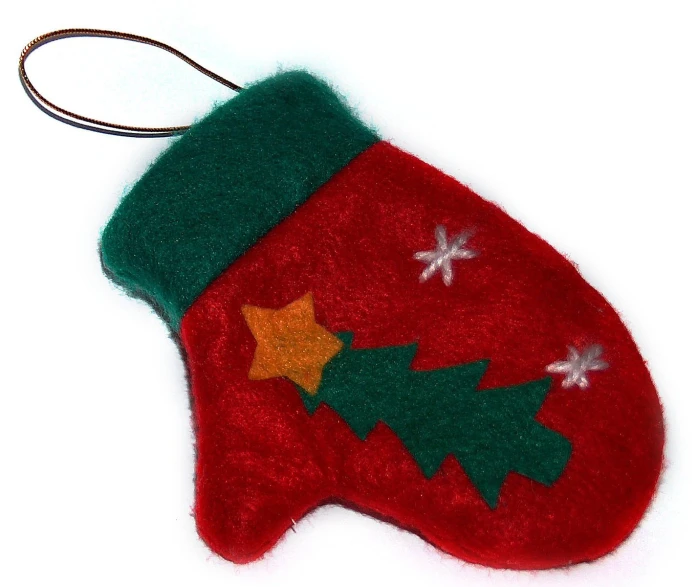 a christmas stocking ornament hanging on a christmas tree nch