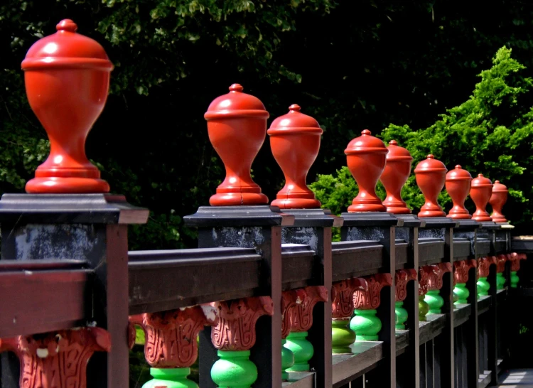 a large fence covered in lots of different colored balls