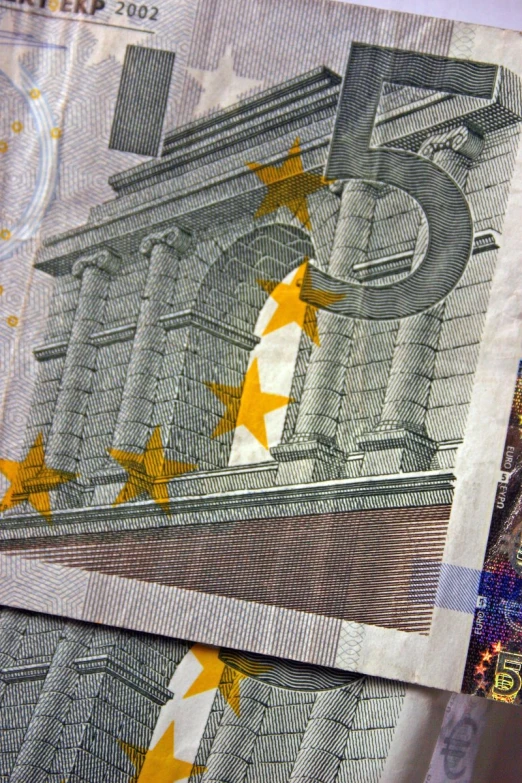 a few euros bills on a table