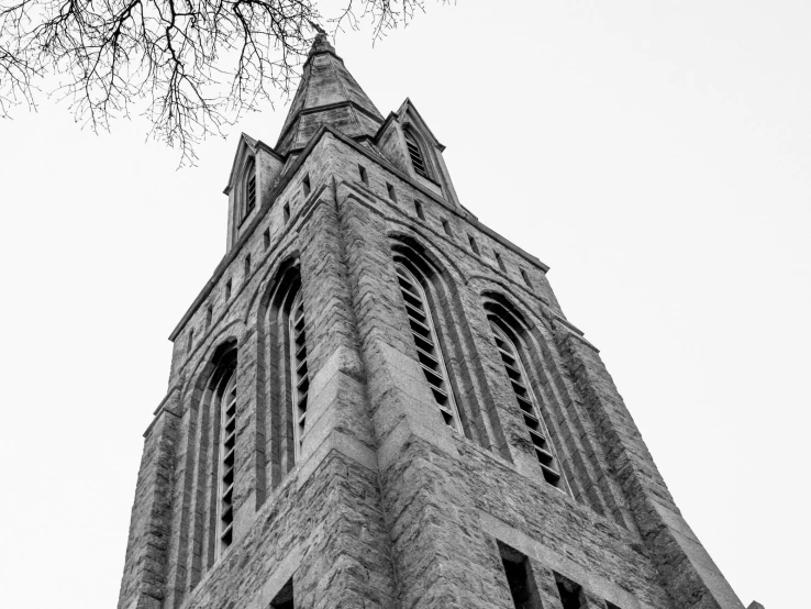 an old steeple with the sky in the background