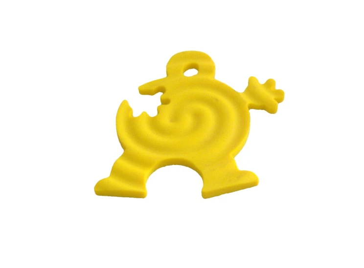 a plastic toy elephant shaped object in yellow on a white background