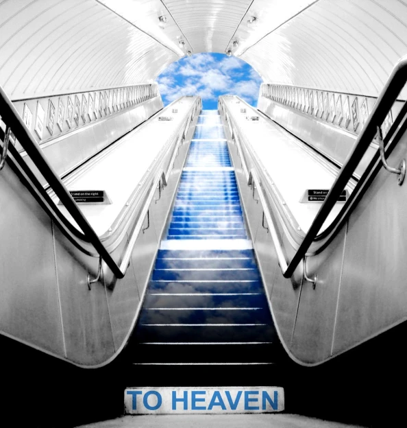 an escalator leading to heaven against a blue sky