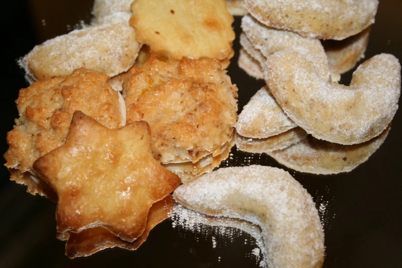 fried food on a black surface is shown