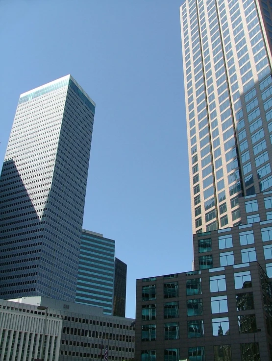 the buildings are tall and high on the city street