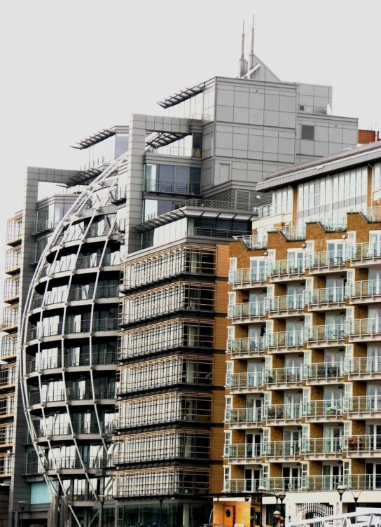 multiple residential buildings next to each other on the water