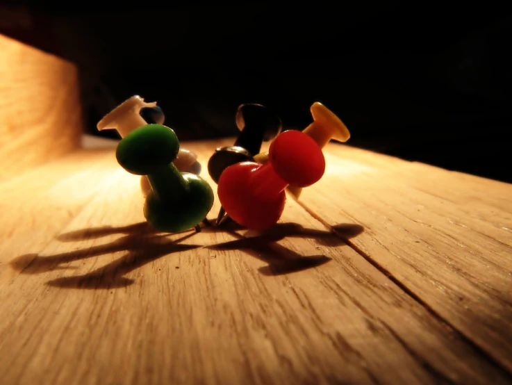 two pieces of candies sitting on top of a wooden table