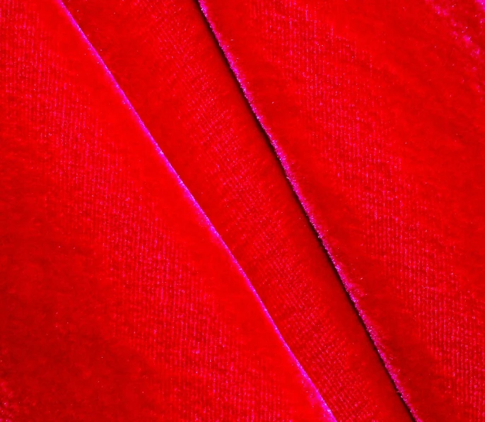 a red fabric texture background for use in a print design