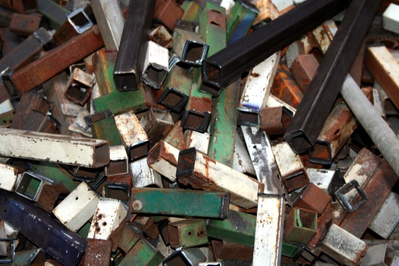 old metal and ceramic pieces of assorted sizes, including rust