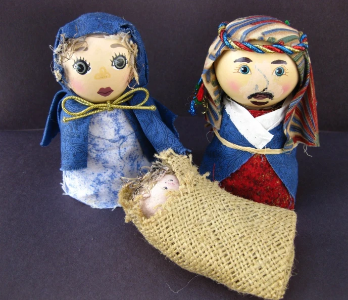 two doll made from old toy material